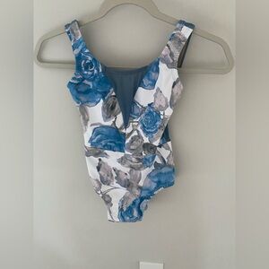 Luckyleo size small.  dusty blue floral color/print